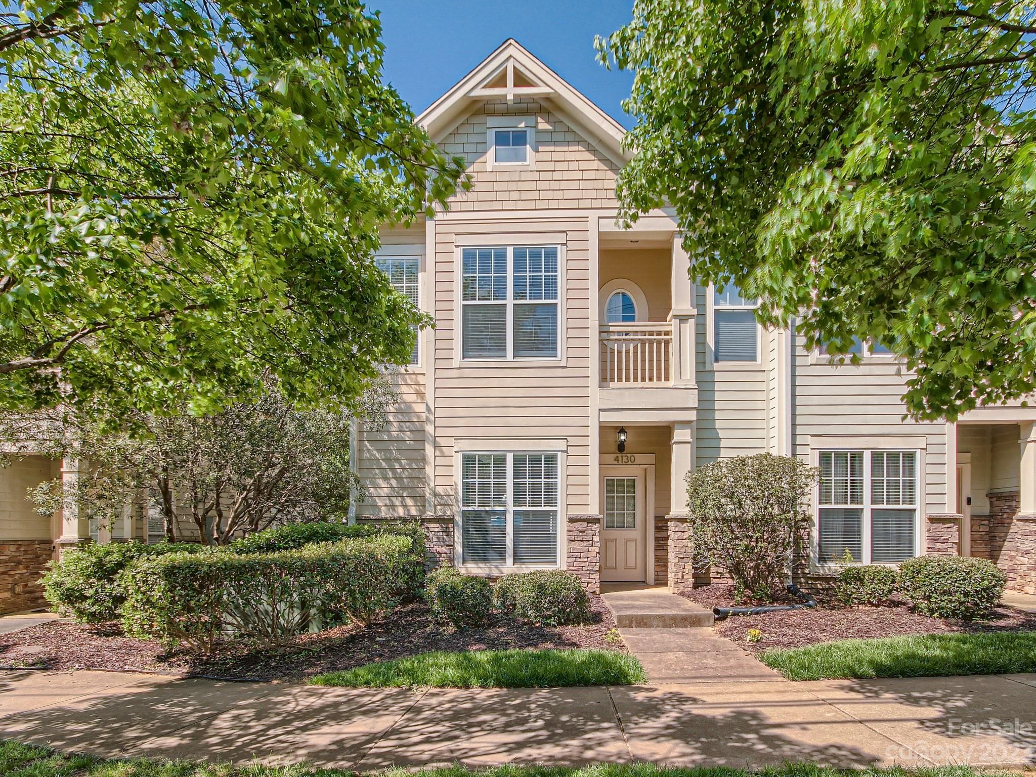 4130 Walker Road Charlotte, NC 28211 - Photo 2 of 28 front view of a house with a yard