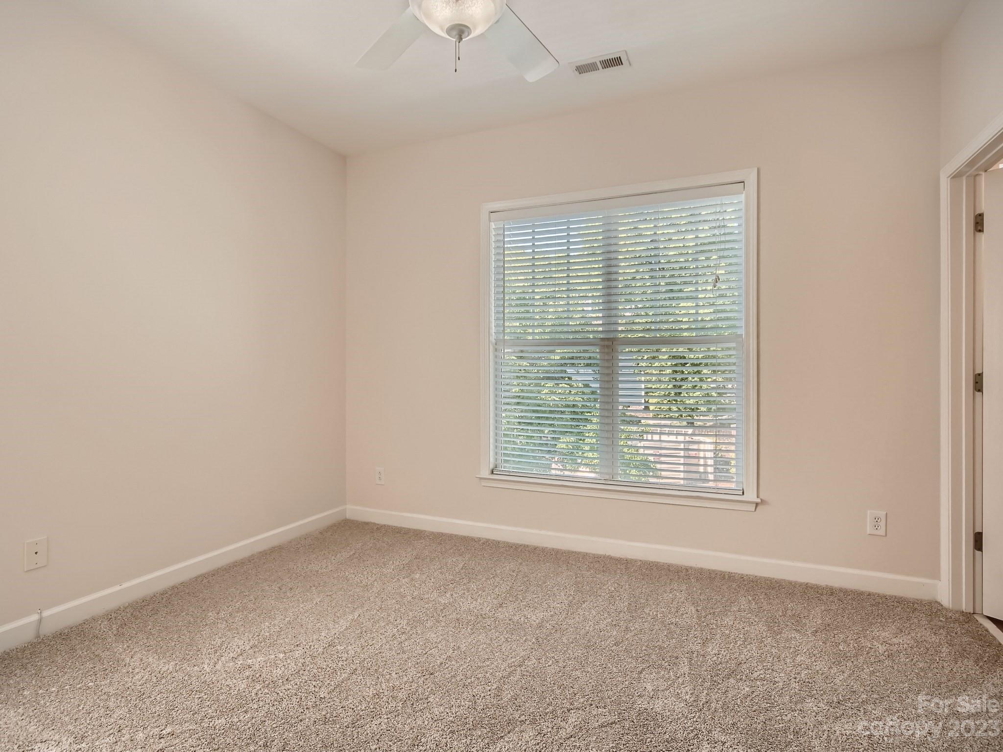 4130 Walker Road Charlotte, NC 28211 - Photo 22 of 28 an empty room with a window