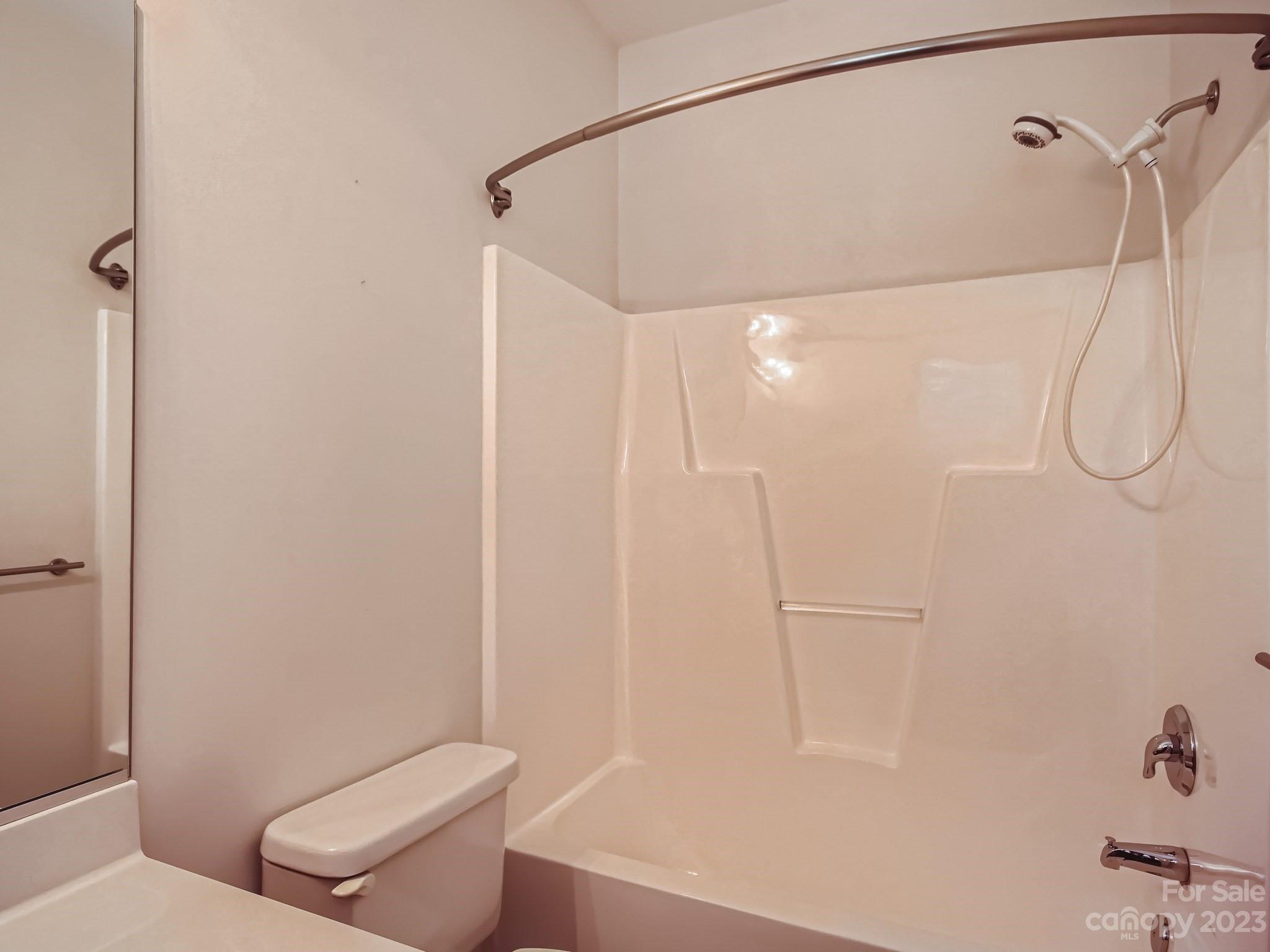 4130 Walker Road Charlotte, NC 28211 - Photo 24 of 28 a bathroom with a shower and toilet