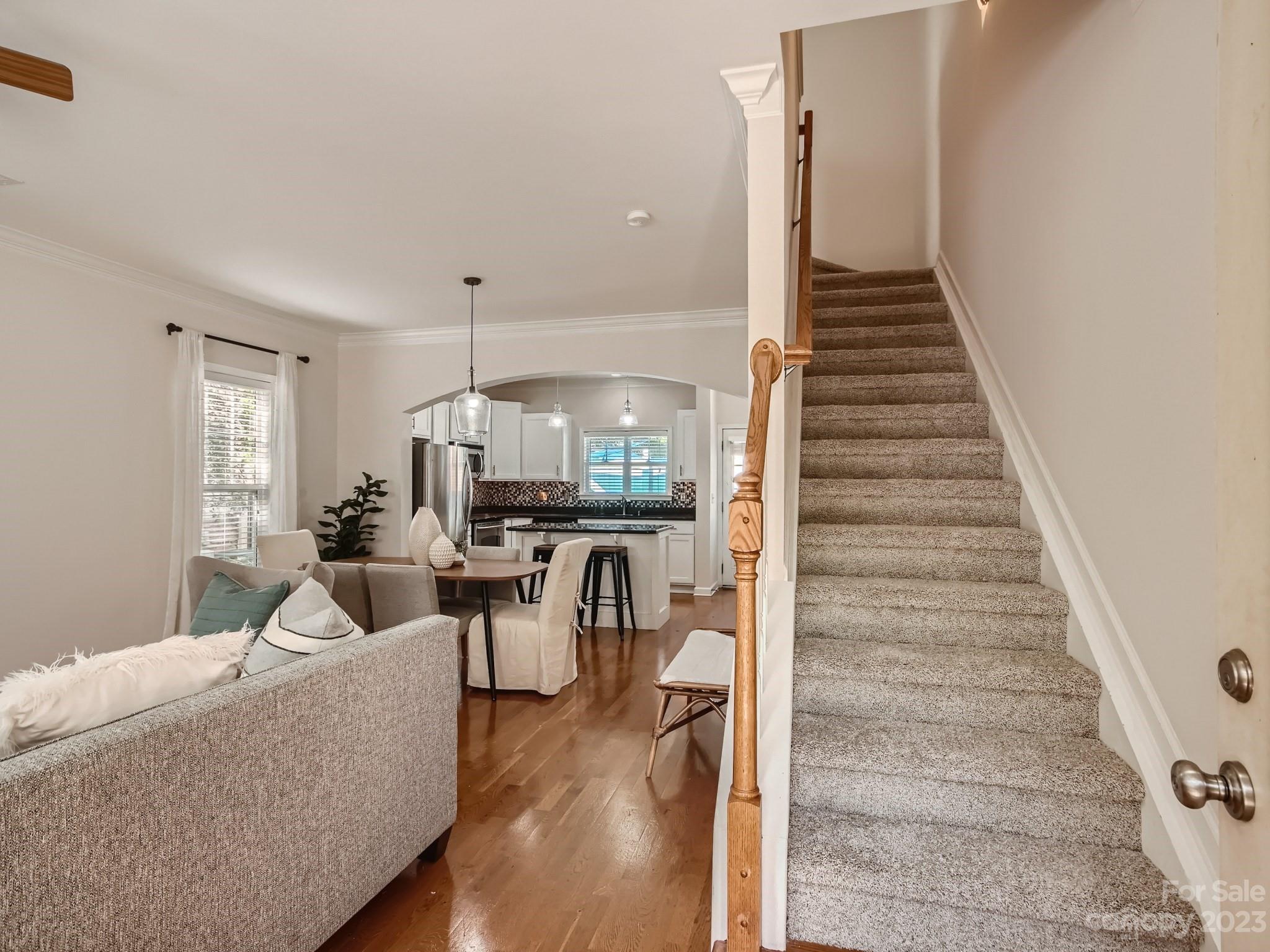 4130 Walker Road Charlotte, NC 28211 - Photo 5 of 28 a living room with furniture and wooden floor