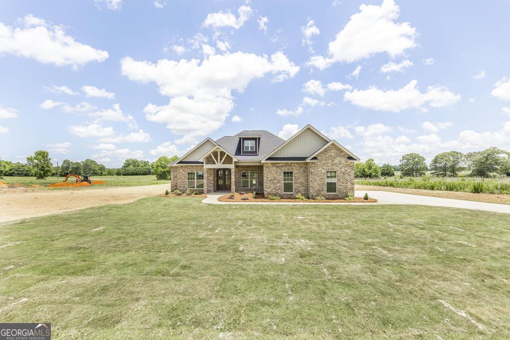 3563 Housers Mill Road Byron, GA 31008 - Photo 4 of 10 a view of houses with outdoor space and swimming pool