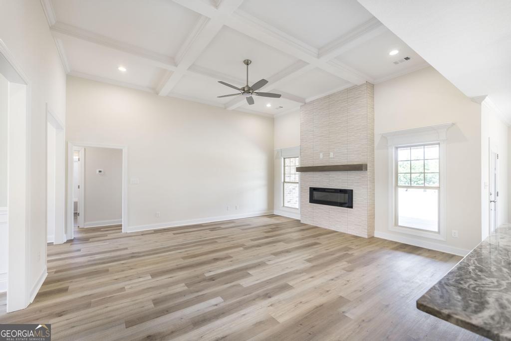 3563 Housers Mill Road Byron, GA 31008 - Photo 7 of 10 an empty room with fan and windows