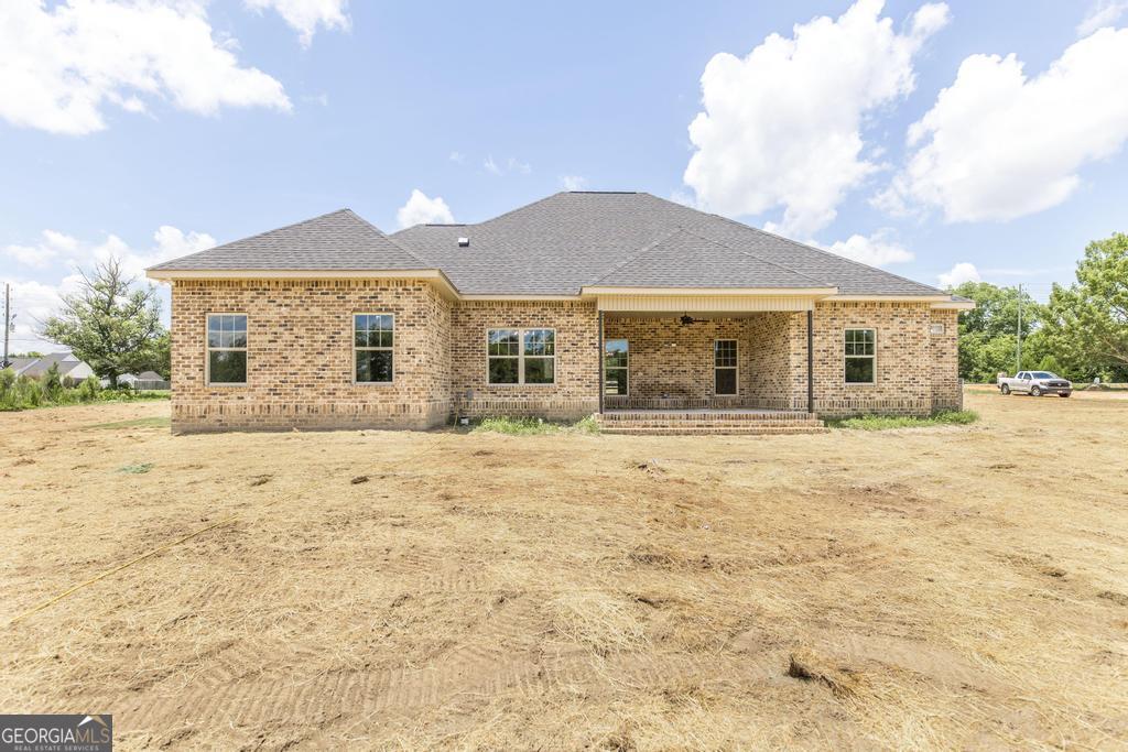 3563 Housers Mill Road Byron, GA 31008 - Photo 8 of 10 a front view of a house with a yard