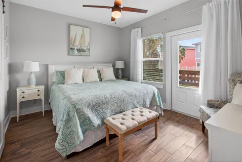 a bedroom with a bed and a view of bathroom