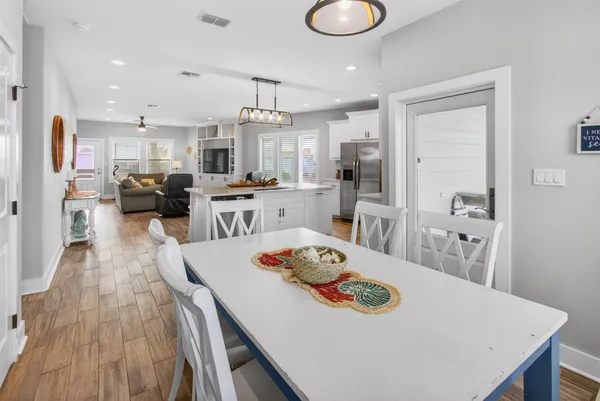 a view of a bathroom from the hallway