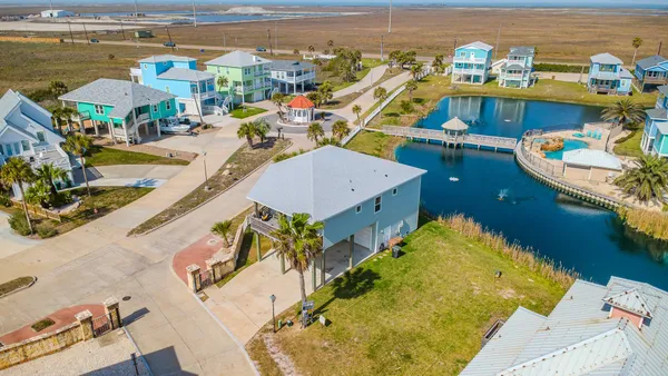 a view of a swimming pool with a lounge chairs