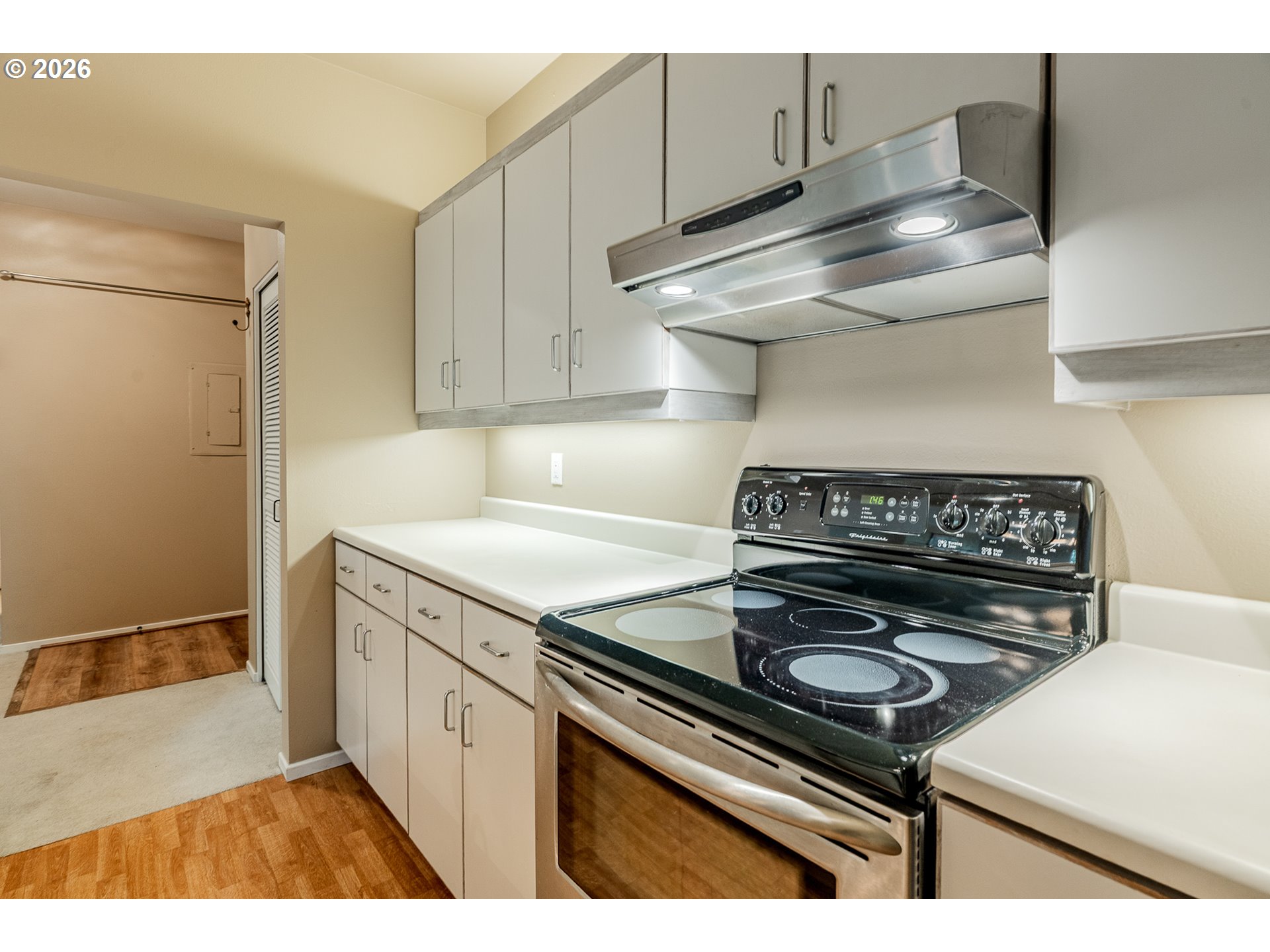 205 South Montgomery Street, Unit 401B Portland, OR 97201 - Photo 12 of 33 a kitchen with a stove and a cabinet