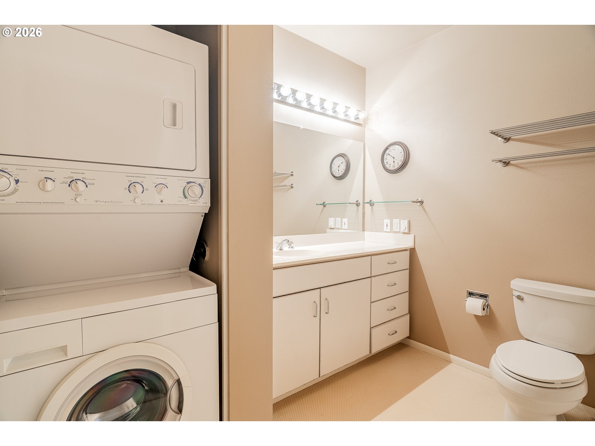 205 South Montgomery Street, Unit 401B Portland, OR 97201 - Photo 21 of 33 a bathroom with a sink a toilet and a mirror