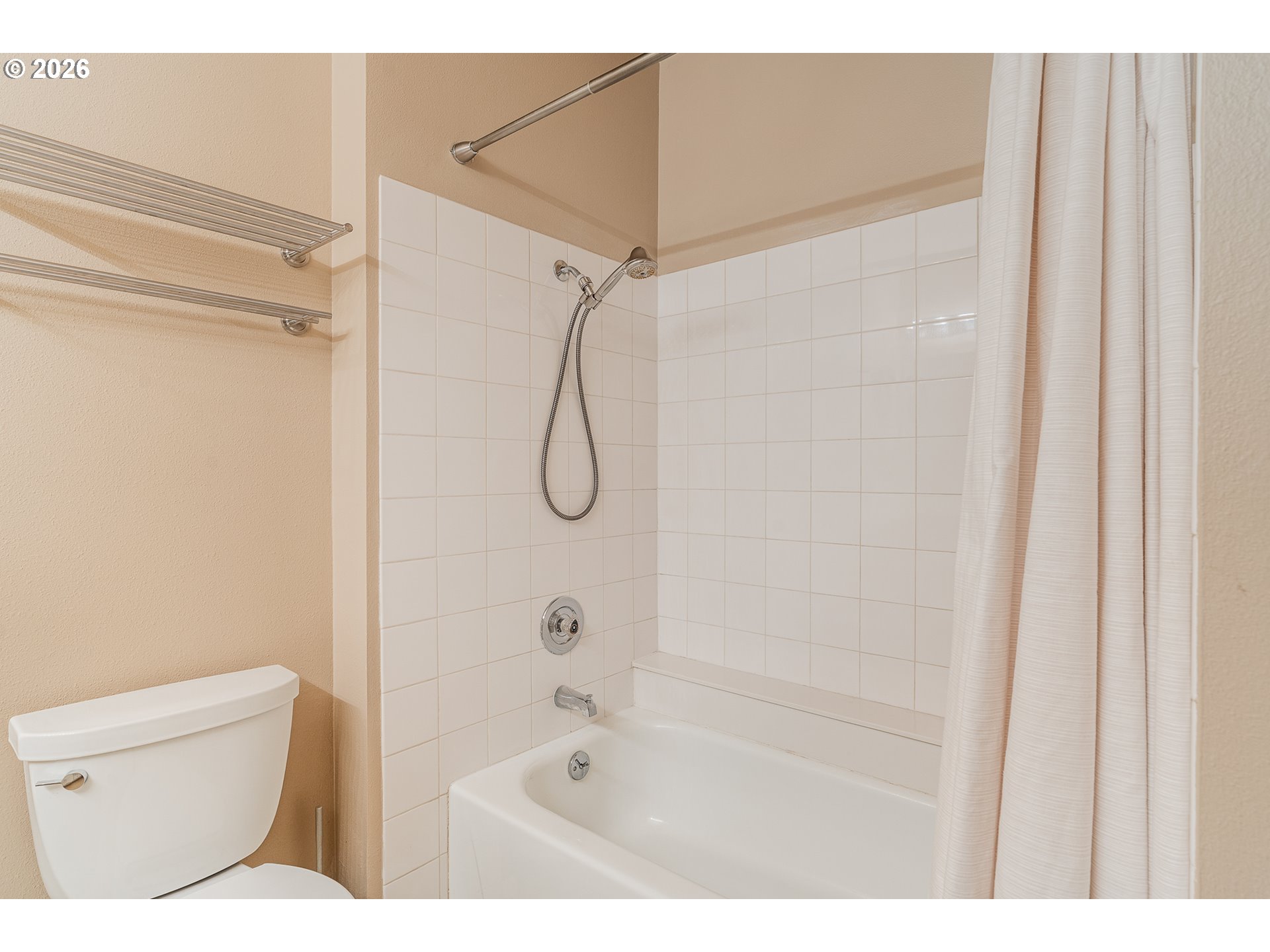 205 South Montgomery Street, Unit 401B Portland, OR 97201 - Photo 23 of 33 a bathroom with a shower a toilet and a shower