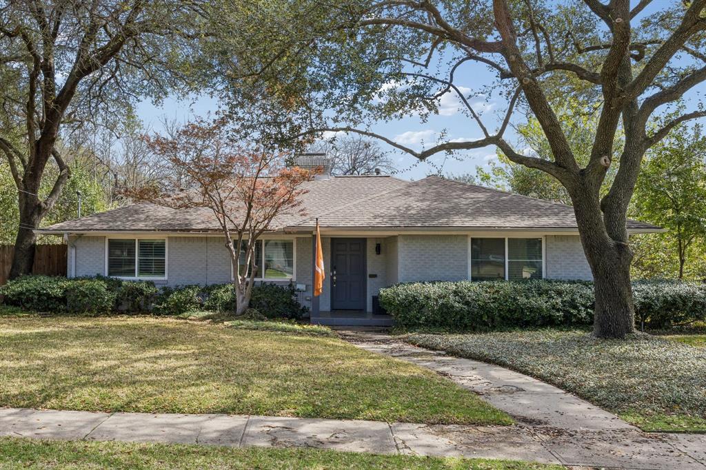 5130 Rexton Lane Dallas, TX 75214 - Photo 1 of 28 front view of a house with a yard