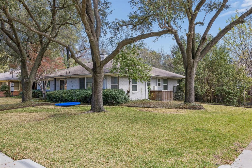 5130 Rexton Lane Dallas, TX 75214 - Photo 2 of 28 a view of a house with a yard
