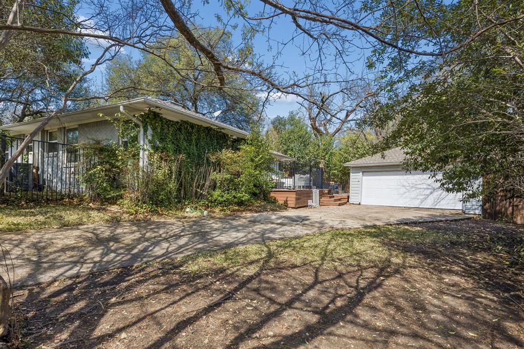5130 Rexton Lane Dallas, TX 75214 - Photo 27 of 28 a view of a house with a yard