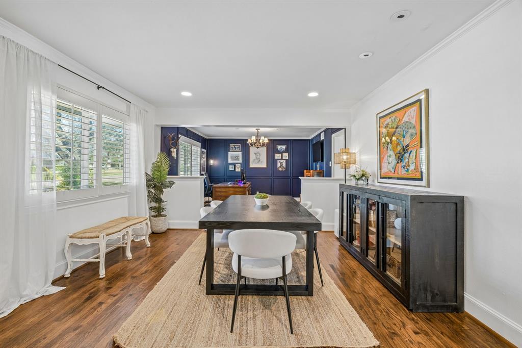 5130 Rexton Lane Dallas, TX 75214 - Photo 3 of 28 a living room with furniture and a wooden floor