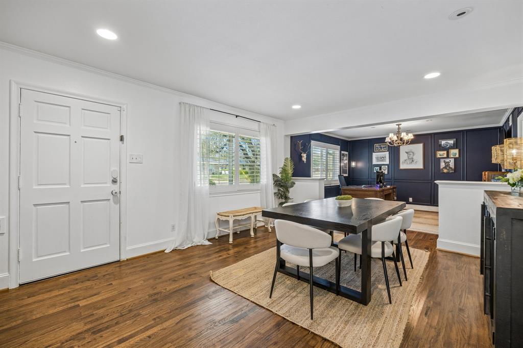 5130 Rexton Lane Dallas, TX 75214 - Photo 4 of 28 a view of a dining room with furniture and wooden floor