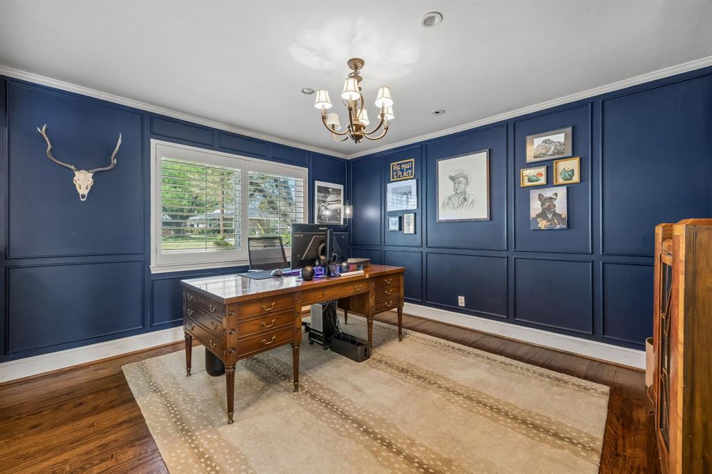 5130 Rexton Lane Dallas, TX 75214 - Photo 7 of 28 a living room with furniture and a chandelier