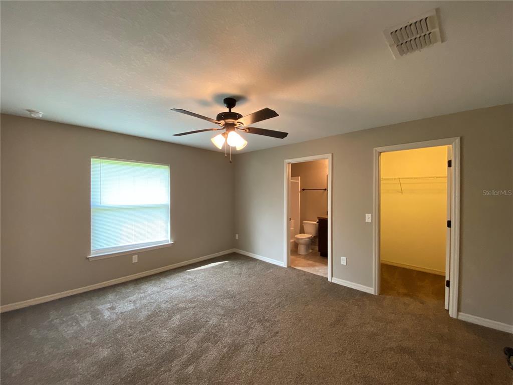 2559 Southwest 159th Lane Ocala, FL 34473 - Photo 12 of 22 a view of an empty room with a window