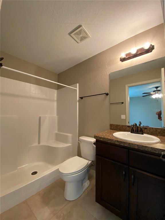 2559 Southwest 159th Lane Ocala, FL 34473 - Photo 14 of 22 a bathroom with a sink a toilet and shower