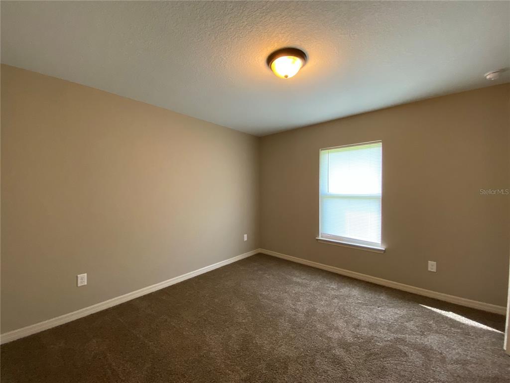 2559 Southwest 159th Lane Ocala, FL 34473 - Photo 19 of 22 an empty room with a window