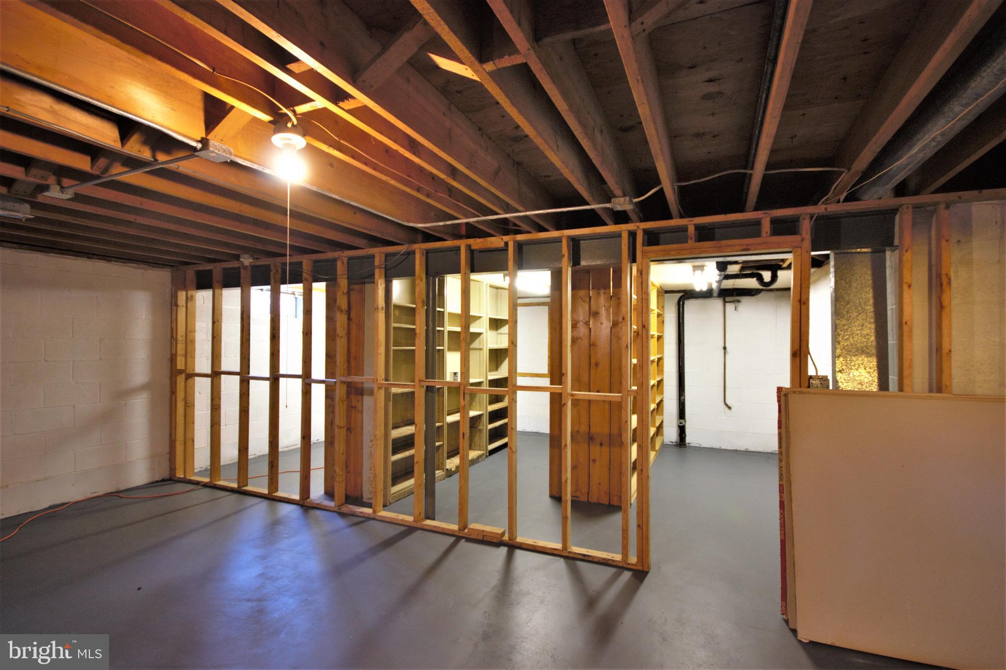 1240 Annapolis Road Odenton, MD 21113 - Photo 17 of 24 Basement with storage shelves