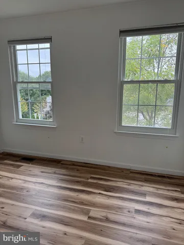 a view of a room that has a window