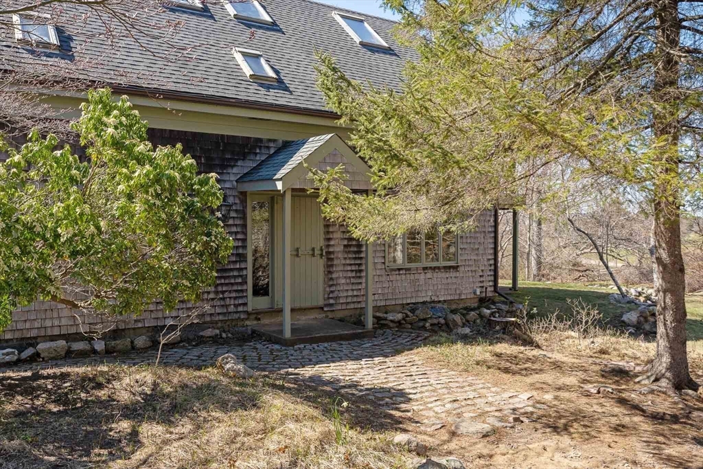 24 Beetle Swamp Road Edgartown, MA 02539 - Photo 2 of 33 a view of a house with a yard
