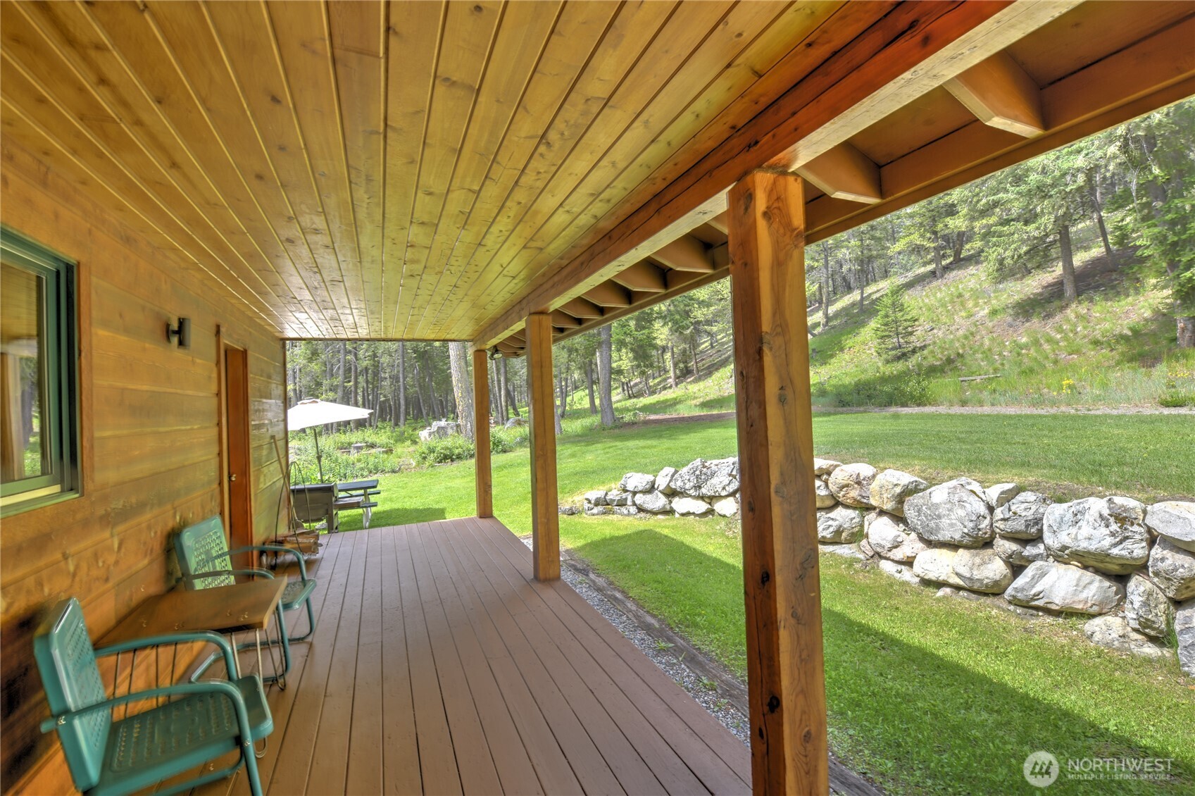 19 2 Rivers Road Mazama, WA 98833 - Photo 14 of 40 a front view of a house with garden