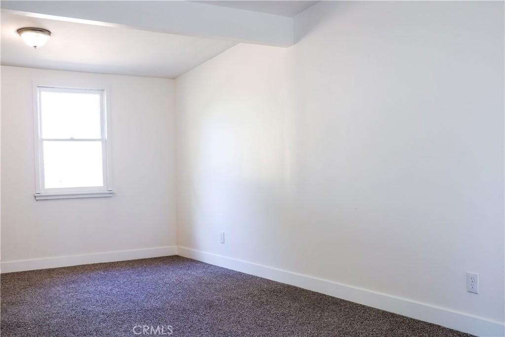 3323 Riverview Drive Jurupa Valley, CA 92509 - Photo 18 of 26 an empty room with a window