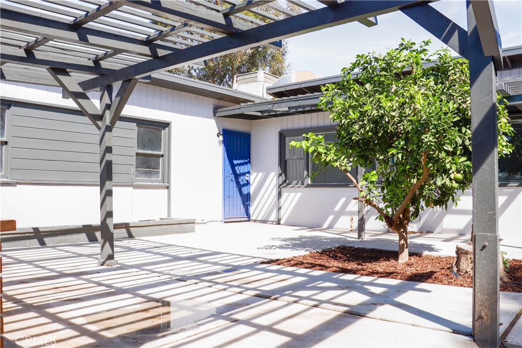 3323 Riverview Drive Jurupa Valley, CA 92509 - Photo 7 of 26 a house with trees in front of it