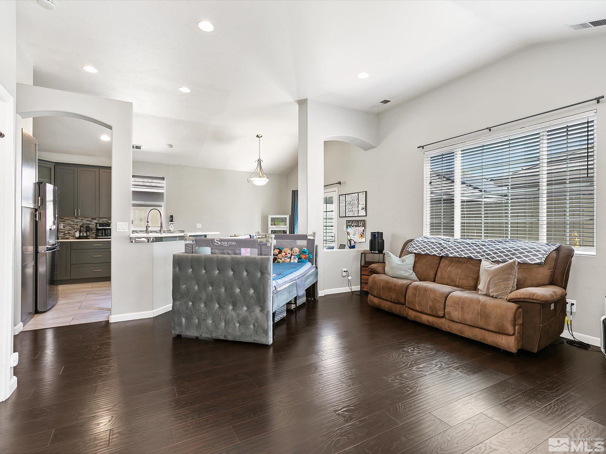 9740 Ripple Way Reno, NV 89521 - Photo 3 of 19 a living room with furniture and a large window