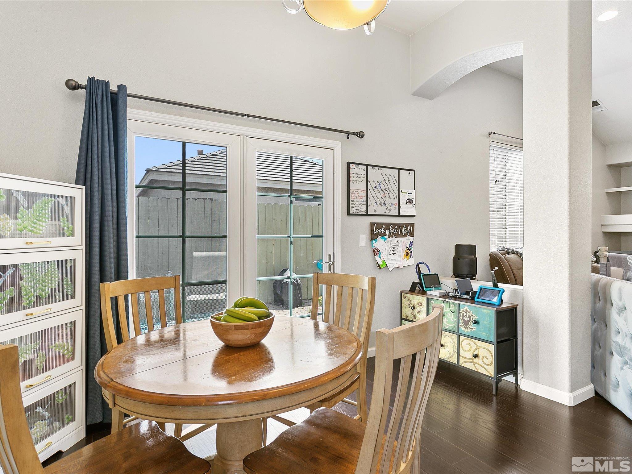 9740 Ripple Way Reno, NV 89521 - Photo 5 of 19 a dining room with furniture and wooden floor