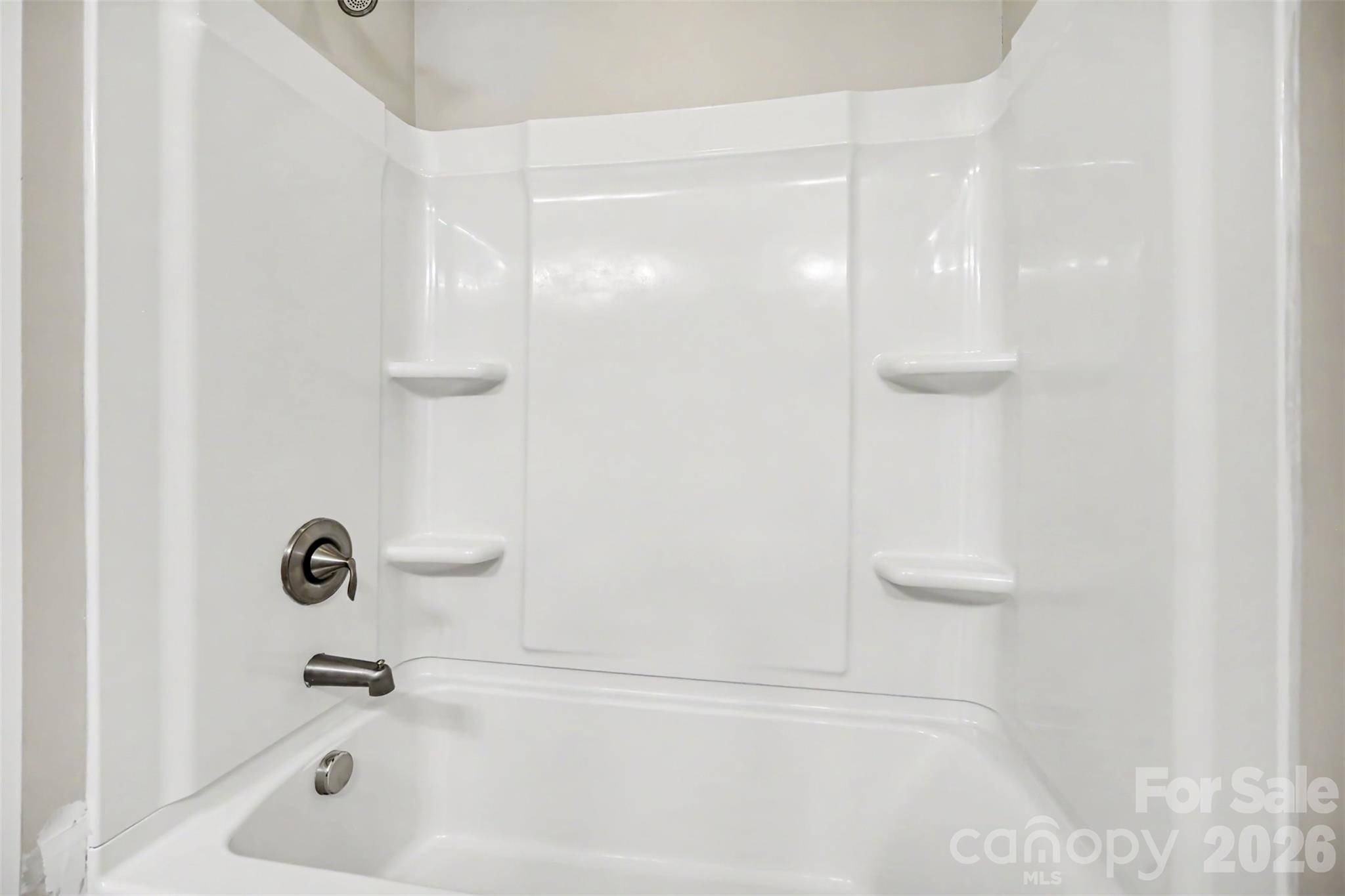 1029 Archibald Avenue Fort Mill, SC 29708 - Photo 29 of 45 a bathroom with a bathtub