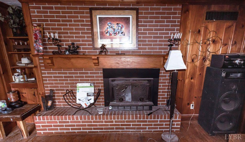 1093 Mt Laurel Road Clover, VA 24534 - Photo 7 of 17 view of a fireplace with wooden floor