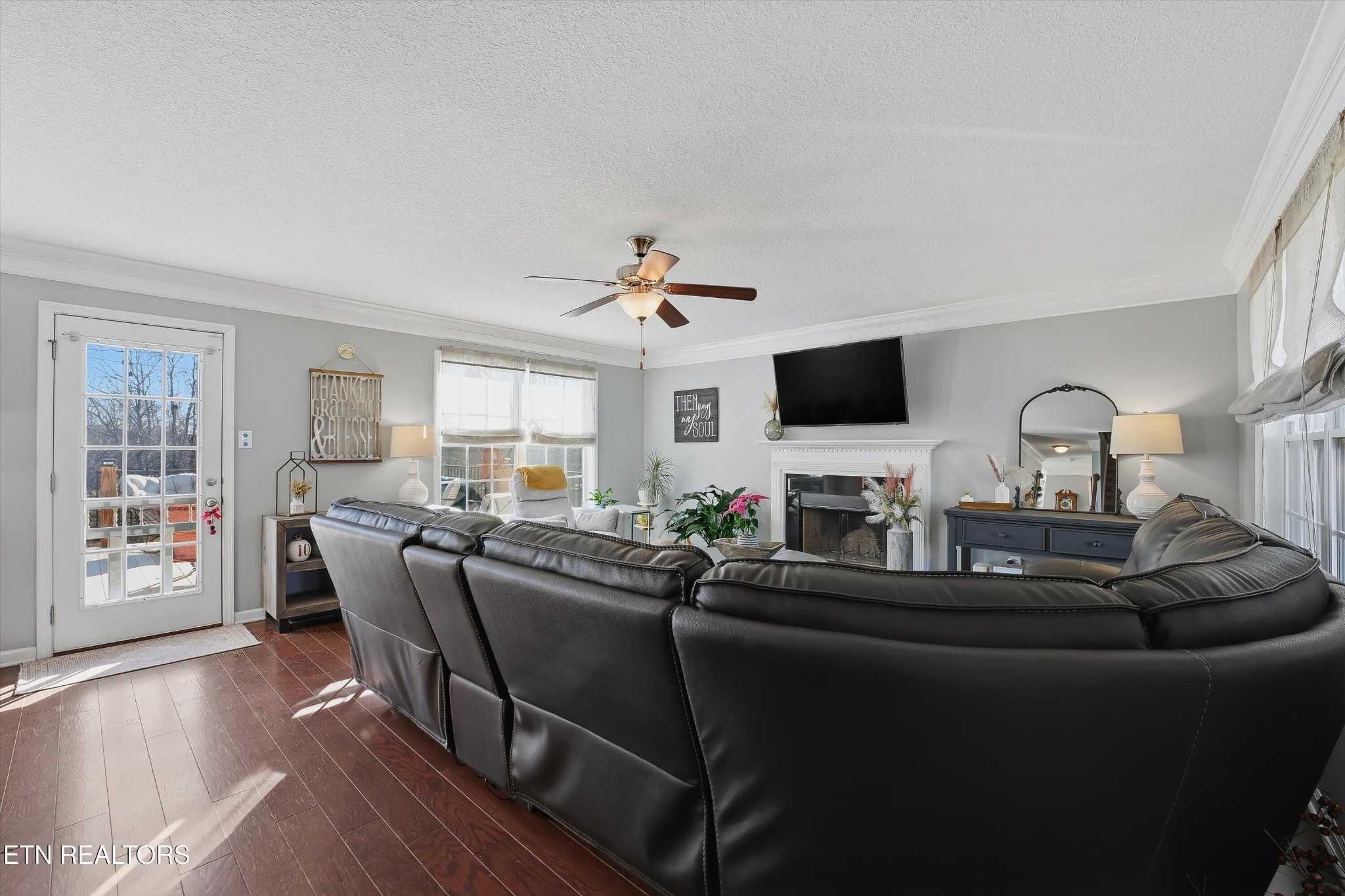 8508 Bowsong Lane Powell, TN 37849 - Photo 3 of 28 a living room with furniture and a flat screen tv