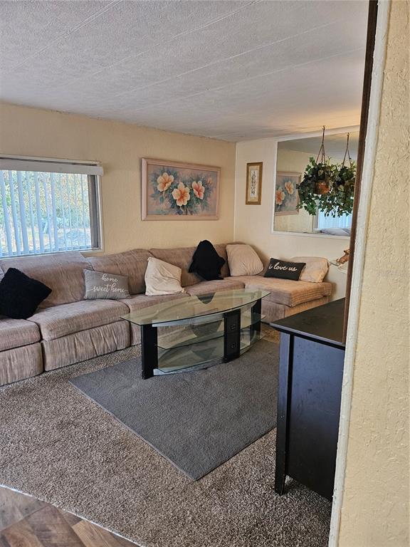 7657 North Caesar Point Dunnellon, FL 34433 - Photo 11 of 20 a living room with furniture and a window