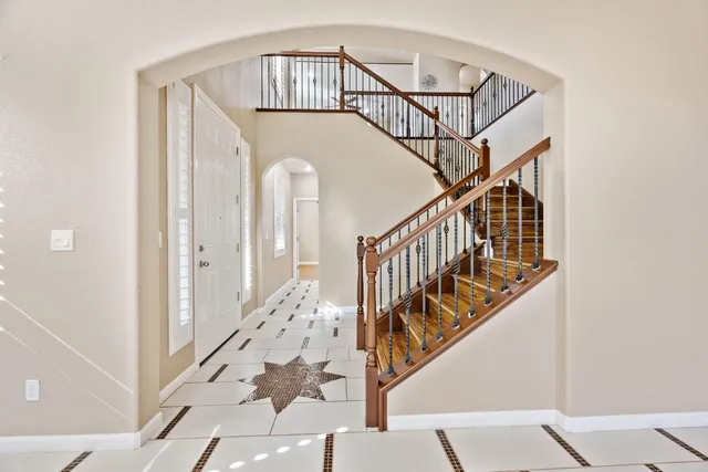 a bathroom with a tub and shower