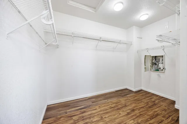 an aerial view of residential houses with city view