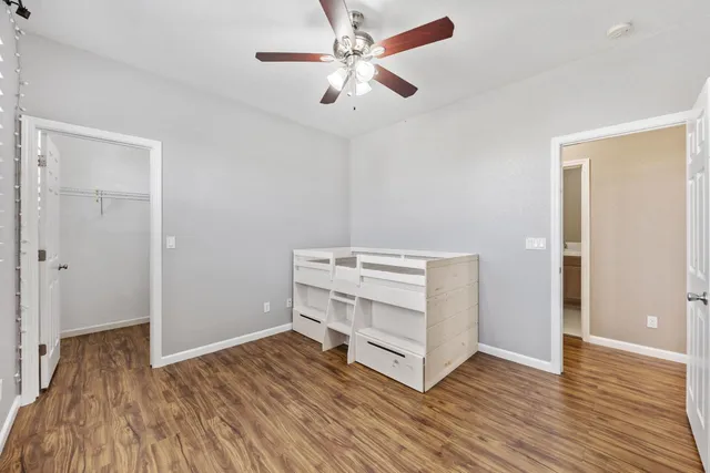a view of swimming pool with outdoor seating and lake view