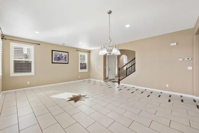 a kitchen with stainless steel appliances granite countertop a sink counter space and cabinets