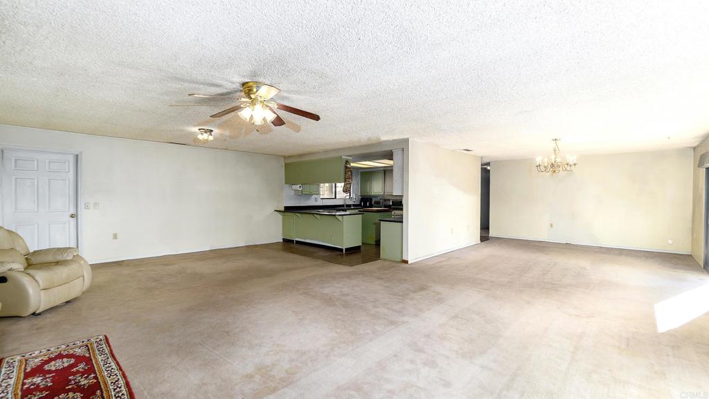 1002 Summer Glen Road Ramona, CA 92065 - Photo 14 of 40 a view of a livingroom with a fireplace