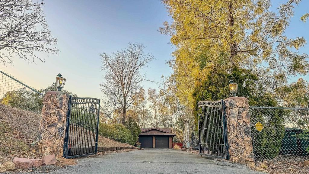 1002 Summer Glen Road Ramona, CA 92065 - Photo 3 of 40 a front view of a house with parking space