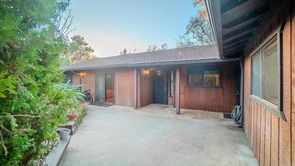 1002 Summer Glen Road Ramona, CA 92065 - Photo 36 of 40 a view of a house with porch and garden