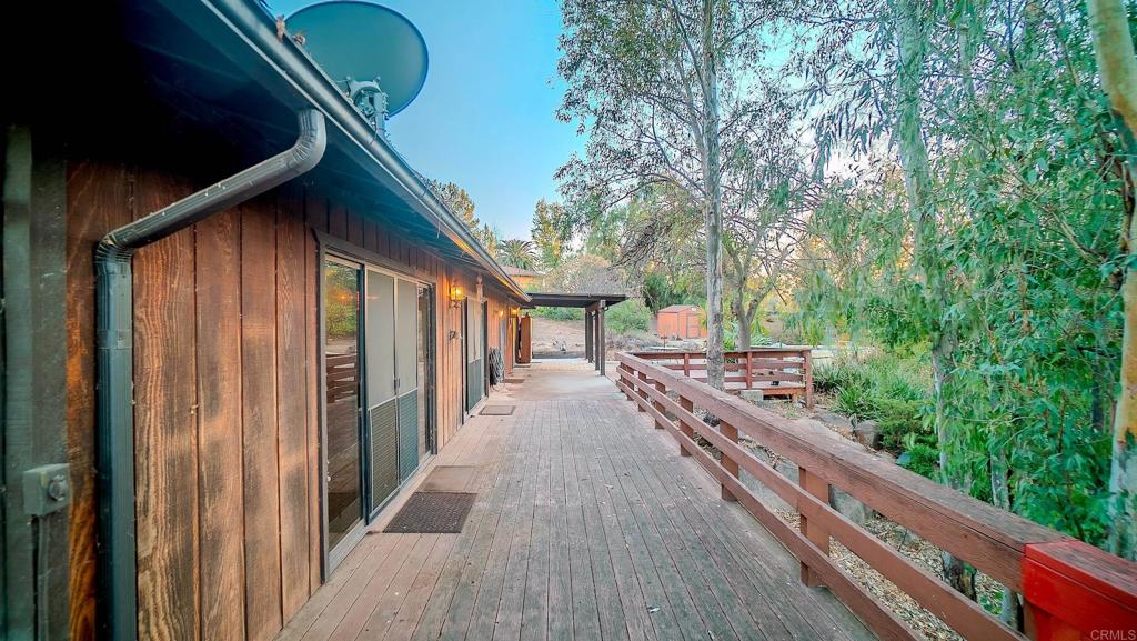 1002 Summer Glen Road Ramona, CA 92065 - Photo 7 of 40 a view of a house with backyard and trees