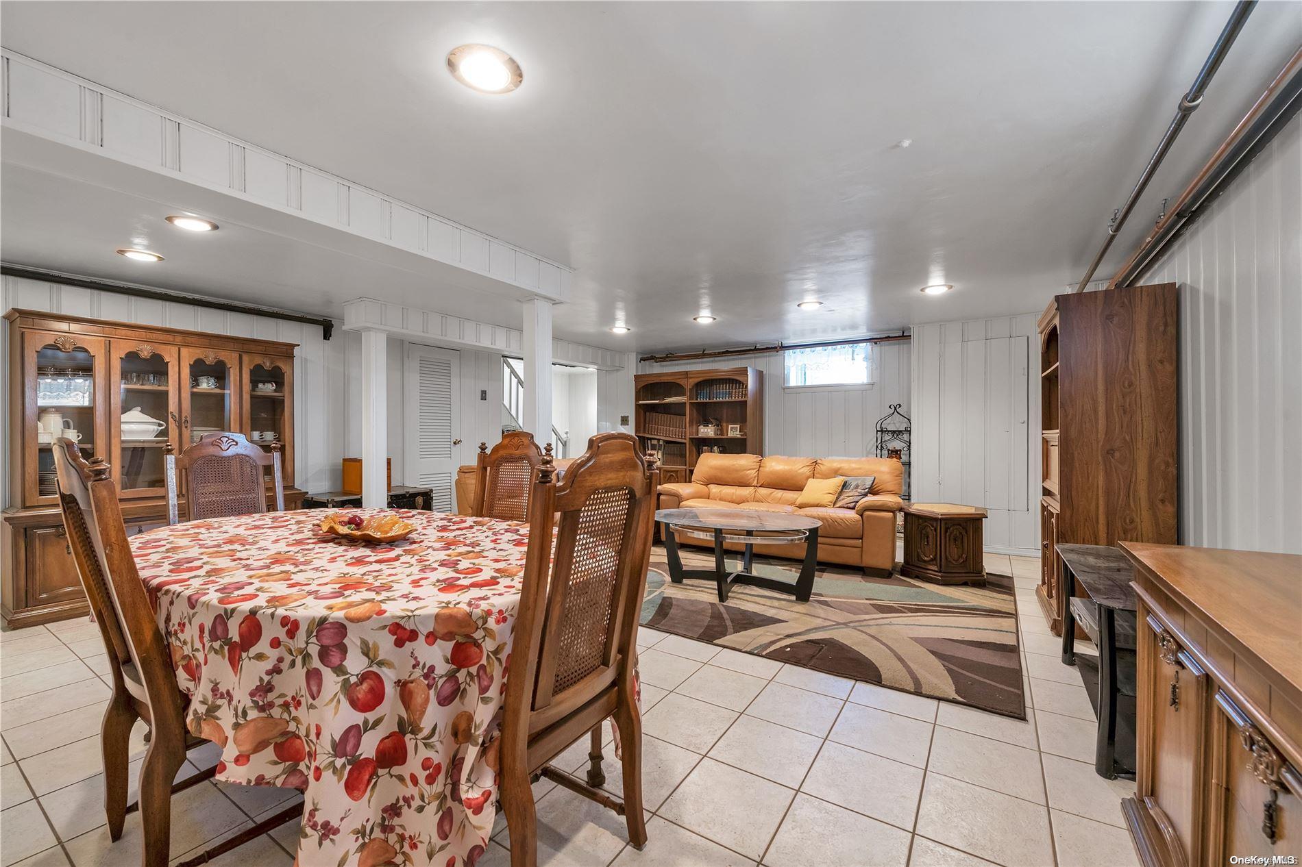 166-40 15th Drive Queens, NY 11357 - Photo 12 of 28 a view of a dining room with furniture