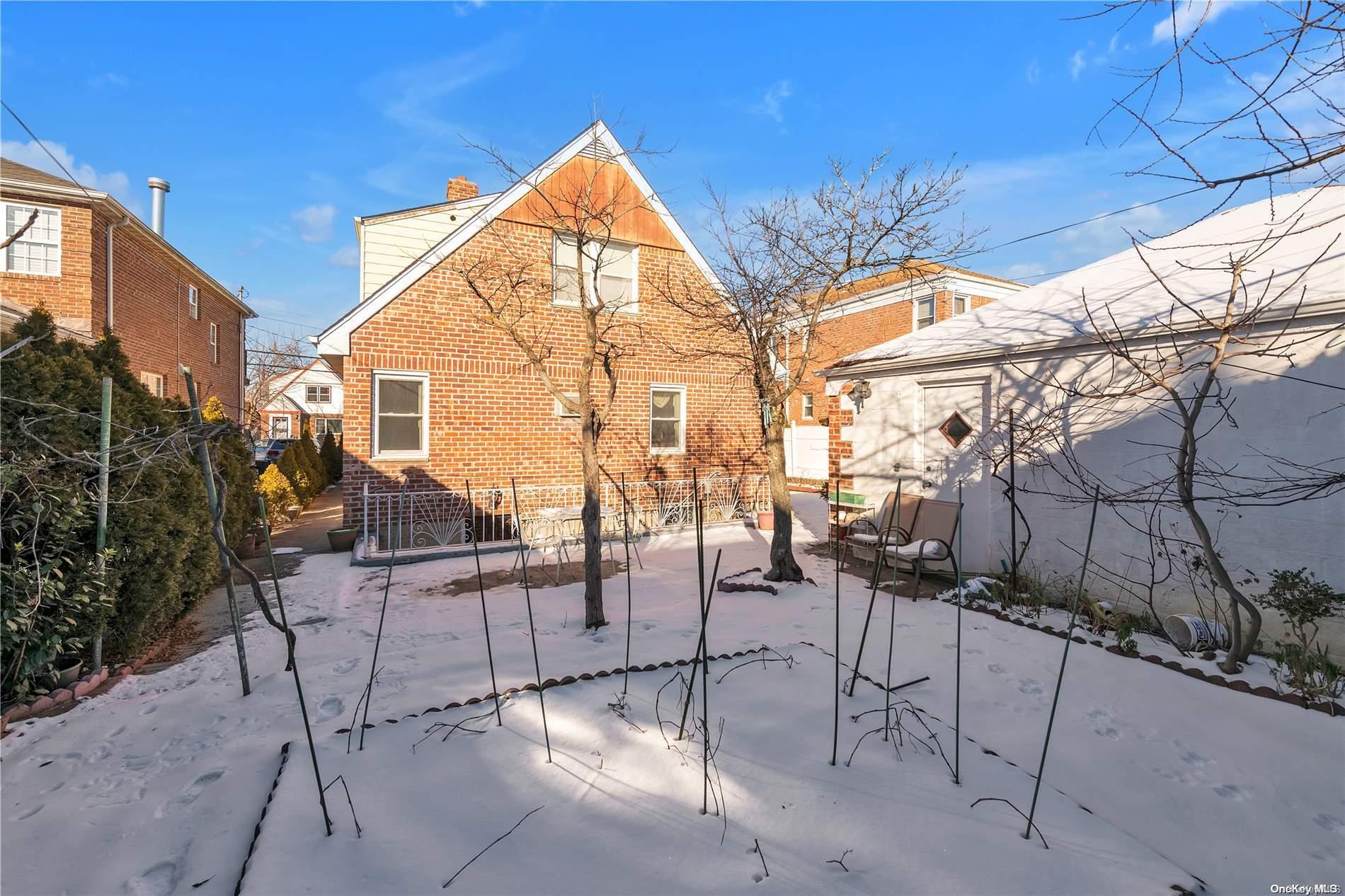 166-40 15th Drive Queens, NY 11357 - Photo 27 of 28 a view of outdoor space yard and patio