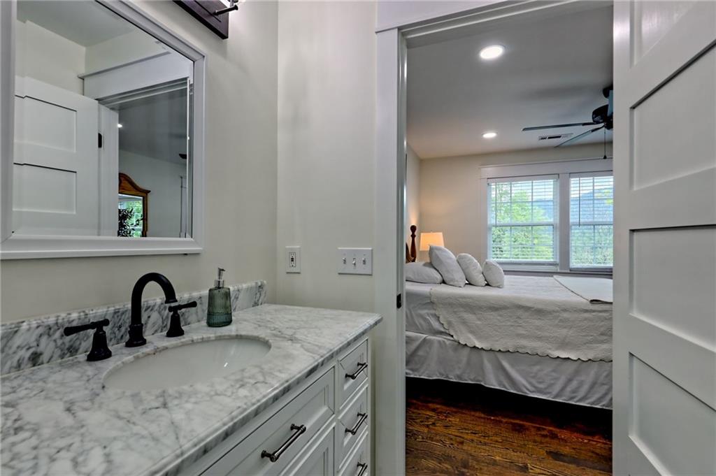 63 Redwood Lane Tiger, GA 30576 - Photo 64 of 77 a bedroom with a bed and a sink