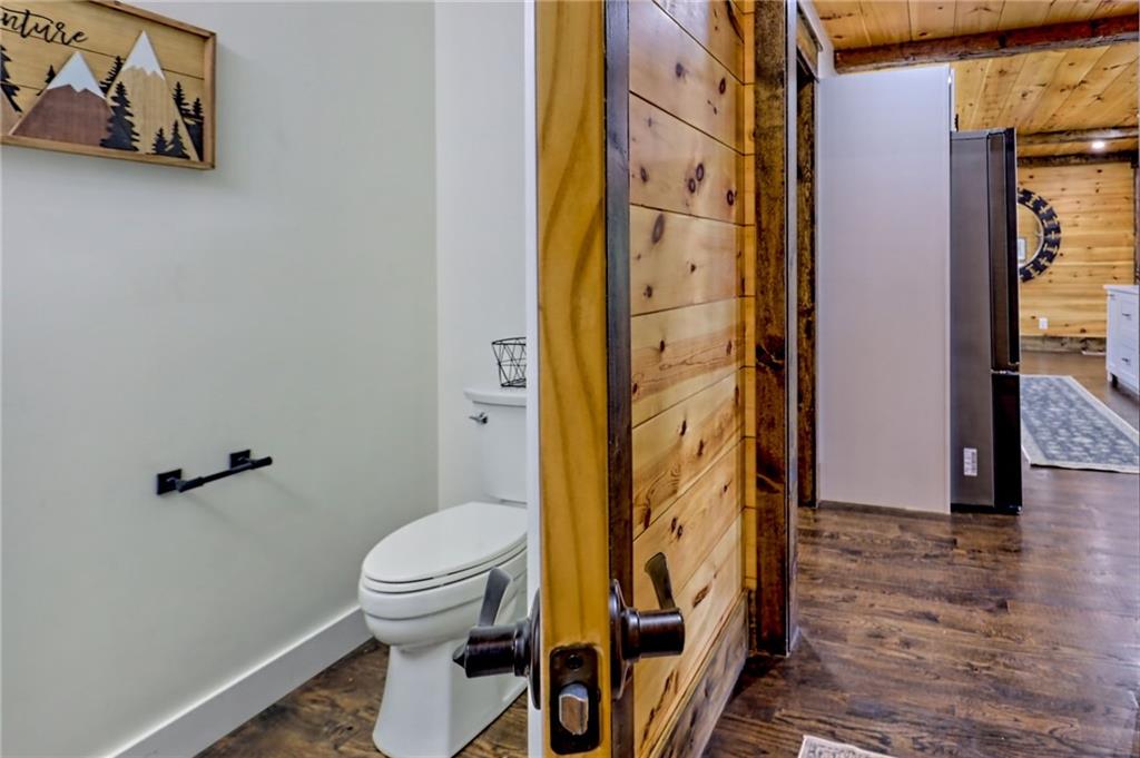 63 Redwood Lane Tiger, GA 30576 - Photo 69 of 77 a bathroom with a toilet and a shower