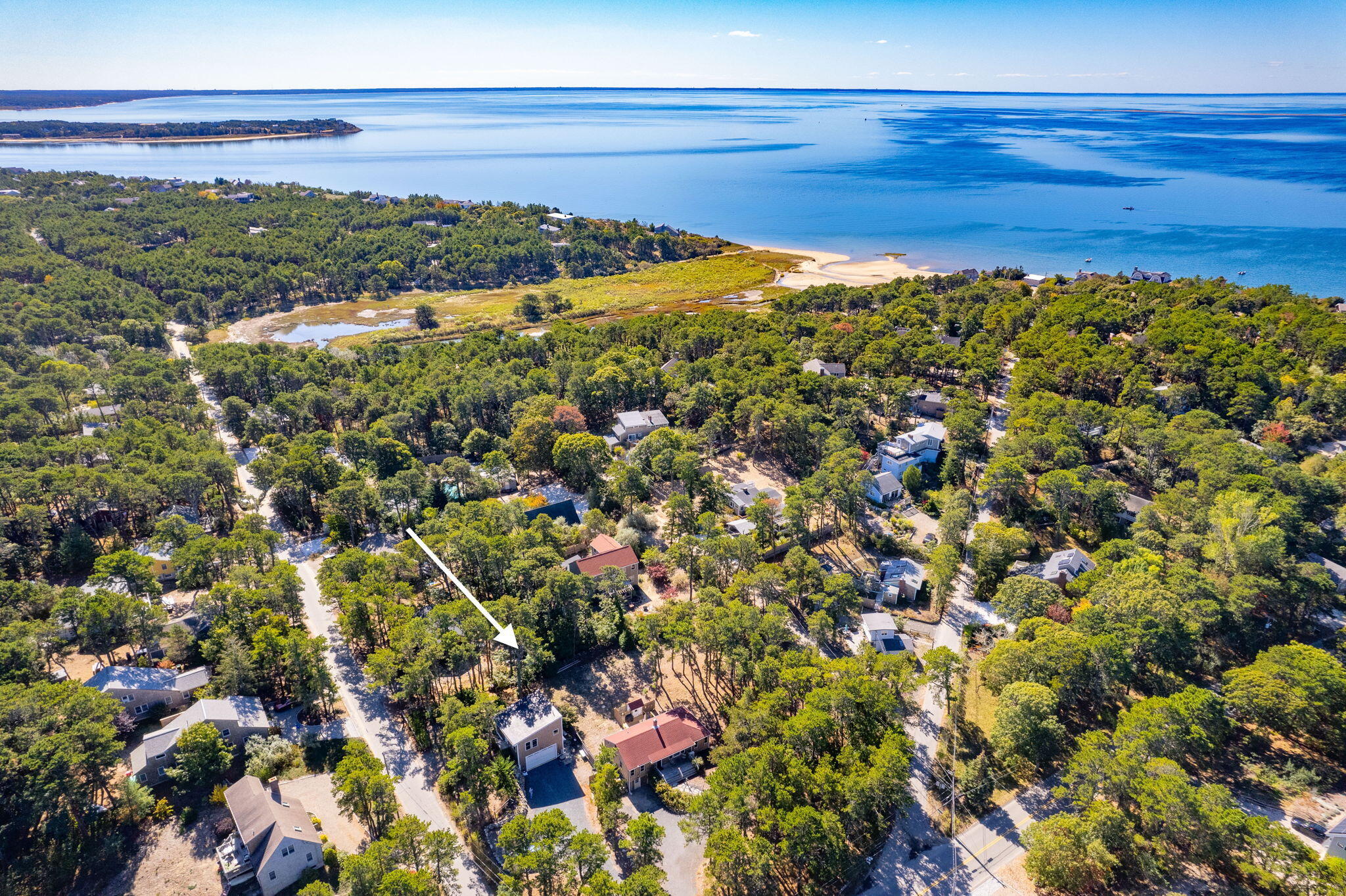 45 Indian Neck Road Wellfleet, MA 02667 - Photo 2 of 68 a view of a field with an ocean