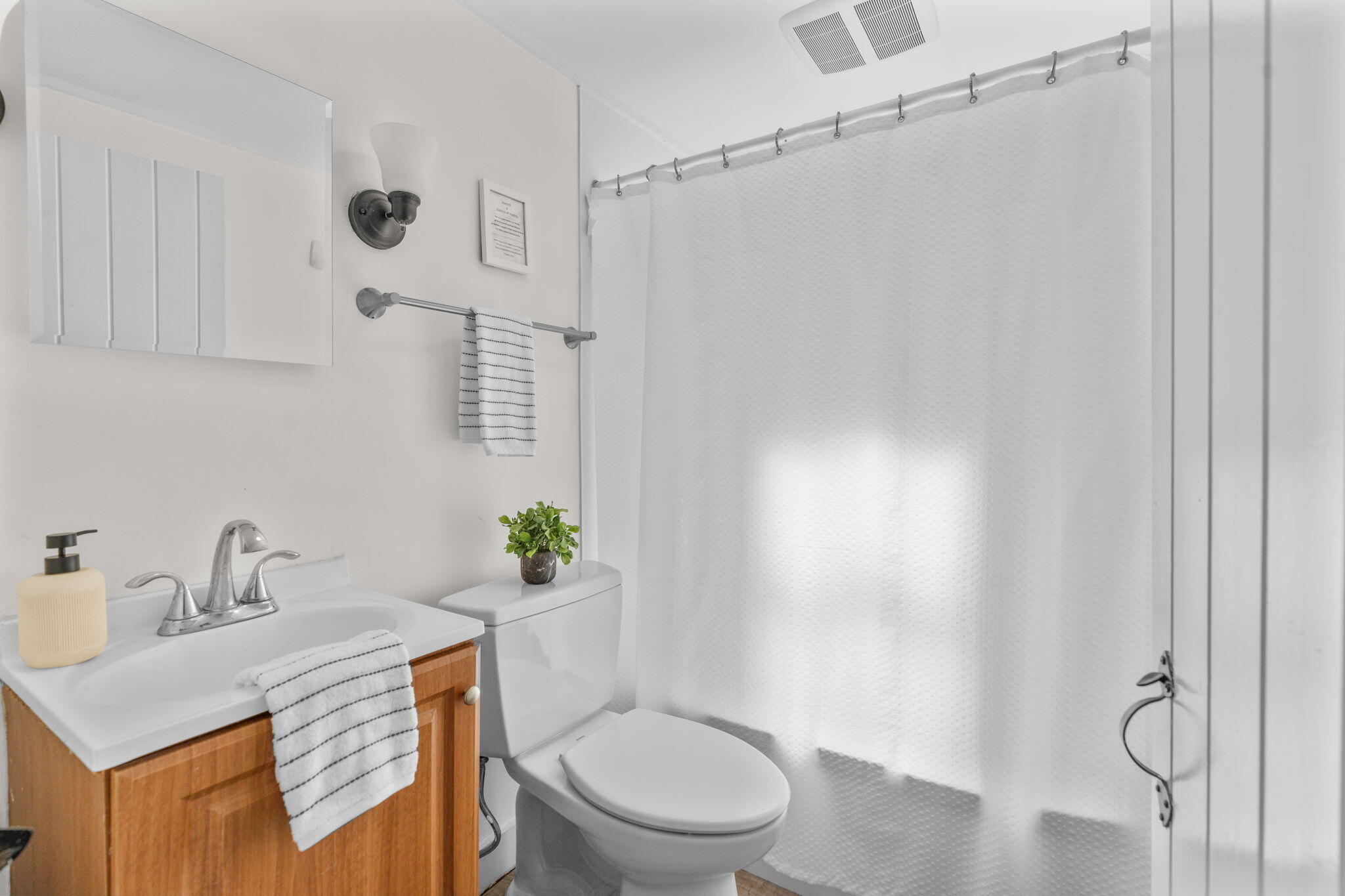 45 Indian Neck Road Wellfleet, MA 02667 - Photo 24 of 68 a bathroom with a sink toilet and shower