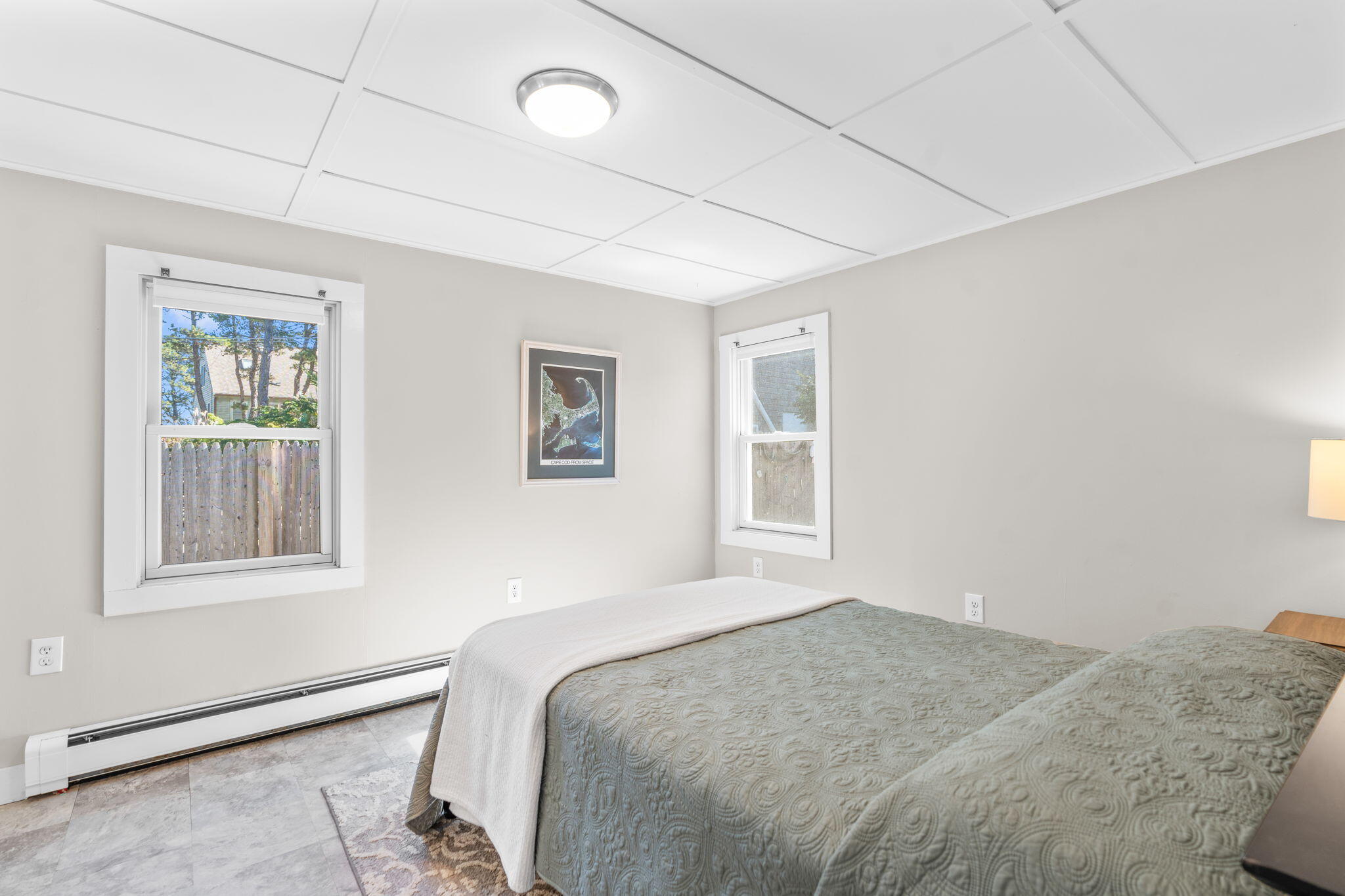 45 Indian Neck Road Wellfleet, MA 02667 - Photo 25 of 68 a bedroom with a bed and a window