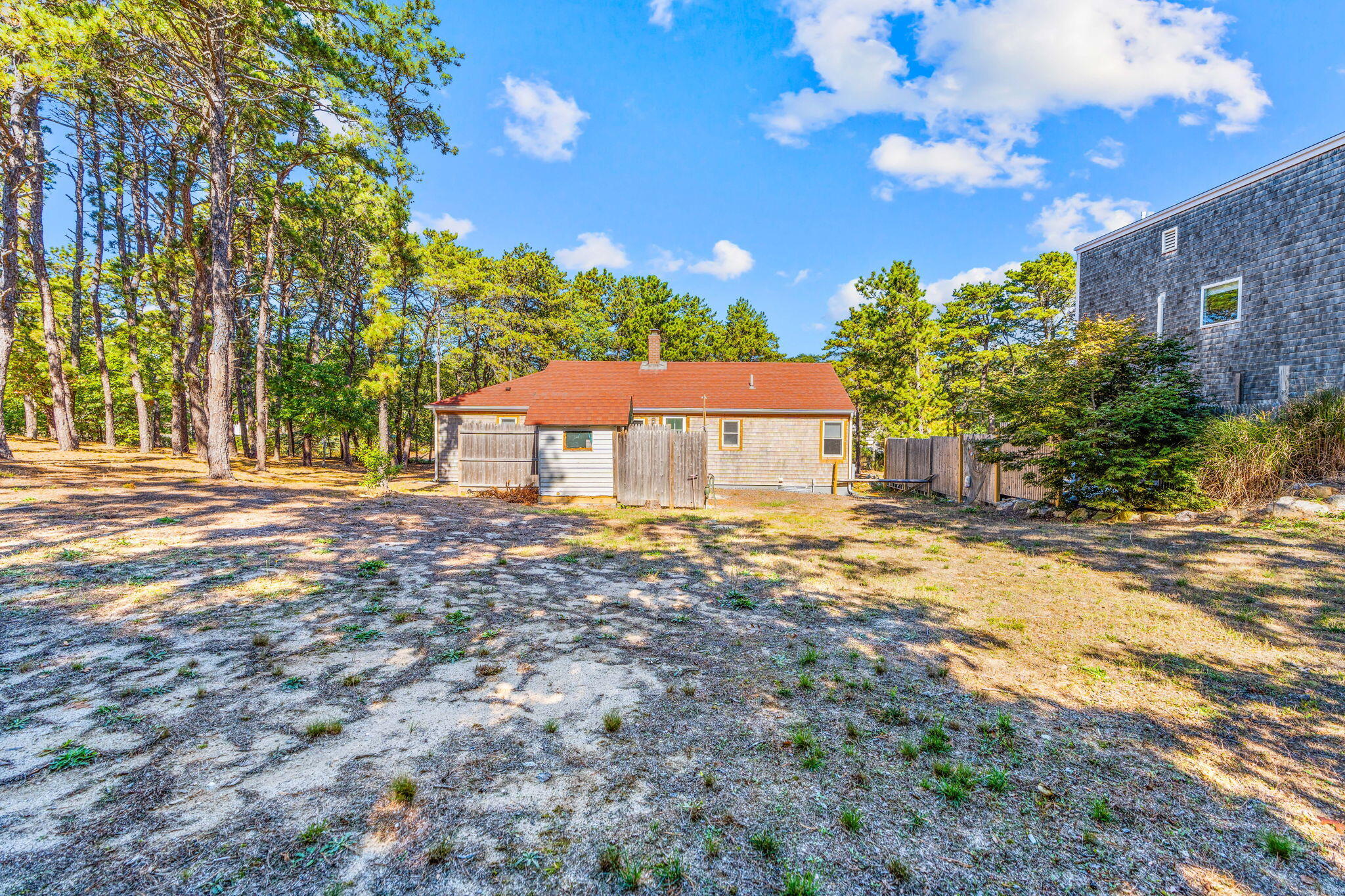 45 Indian Neck Road Wellfleet, MA 02667 - Photo 33 of 68 a bathroom with a sink and a yard